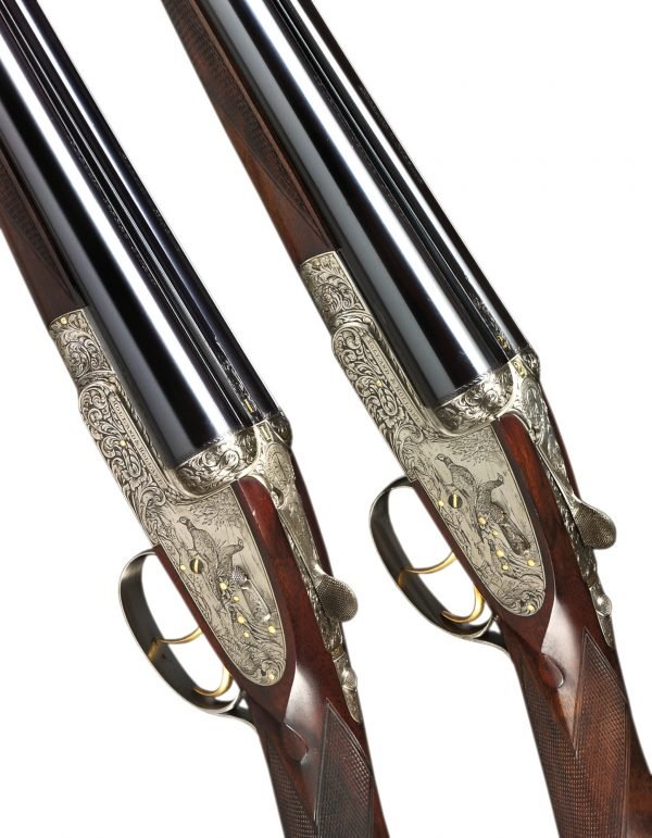 Holland & Holland Royal Deluxe Sidelock Pair 12ga/76mm - 28" (71 cm) namlu - 3,5 kg - Tam çakmak, ejektörlü - Sülün figürlü gravür, eski gümüş perdah -1-